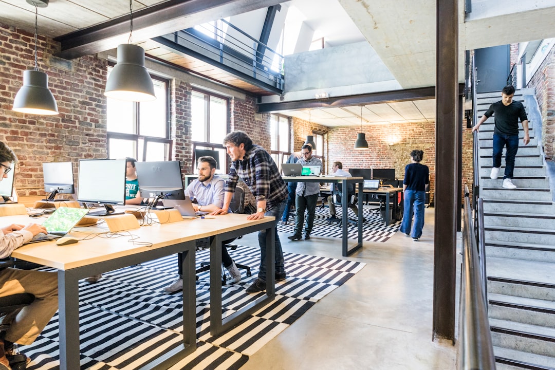 Truvex team discussing software architecture in a modern office